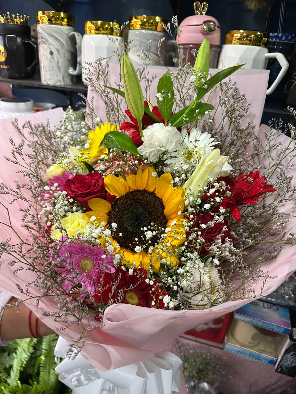 Sunflower, lily, rose, and gerbera mixed bouquet